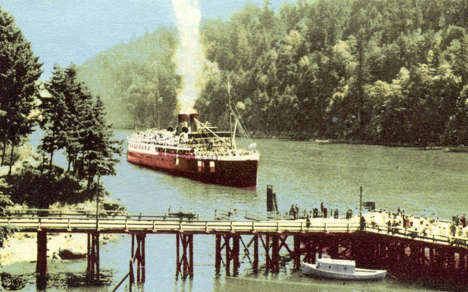 Photo of old steamship about to dock