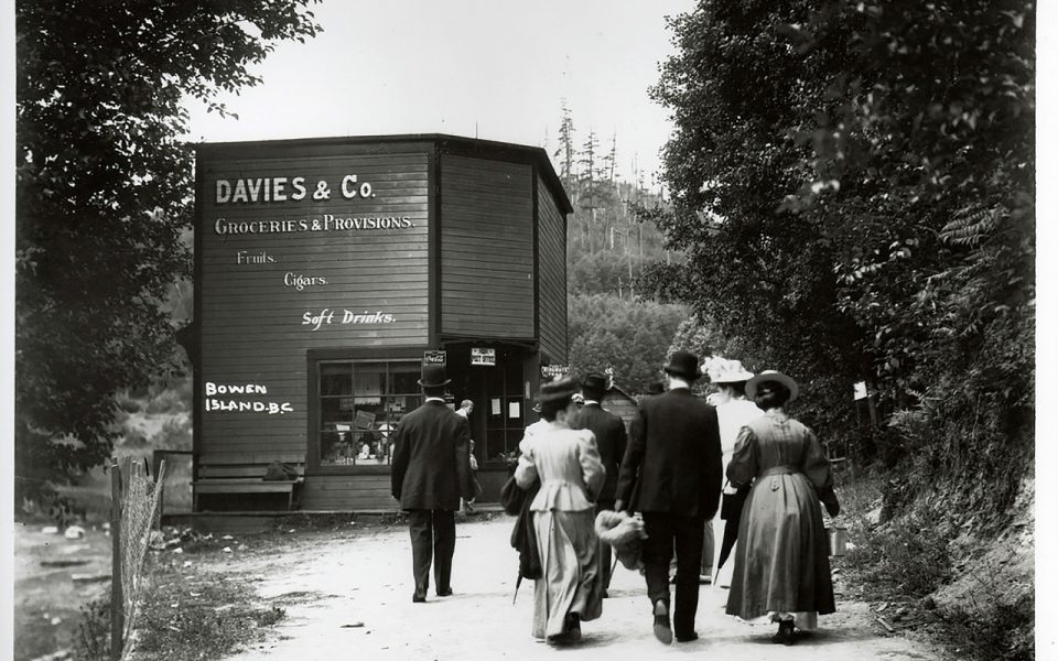 Black and white picture of old store with name Davies & Co. Groceries & Provisions