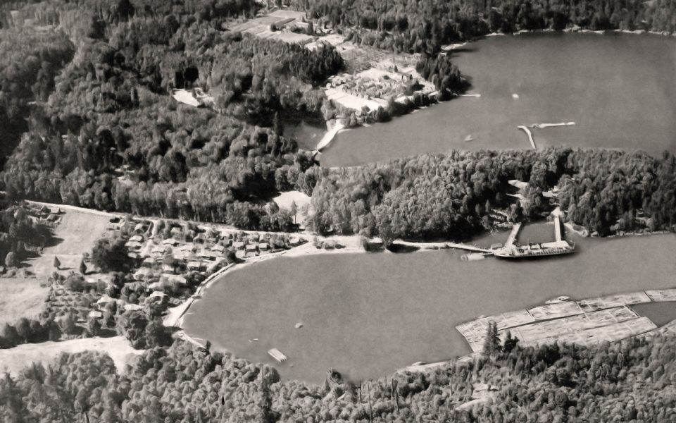 Black and white picture of Snug Cove, Bowen Island from the air